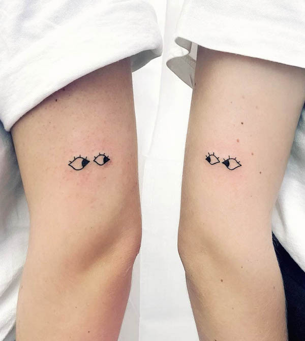 Cute eyes tattoos for sisters by maestro tattoo