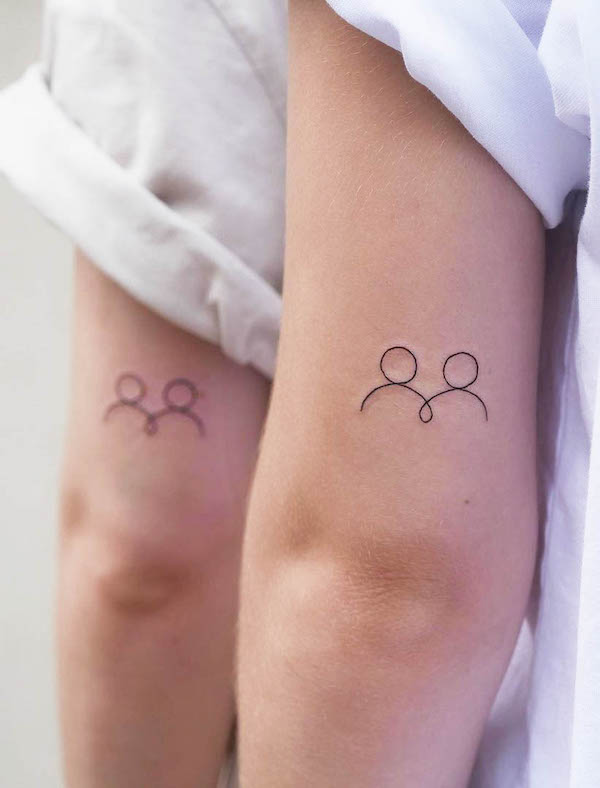 Simple dual tattoos by maestro tattoo