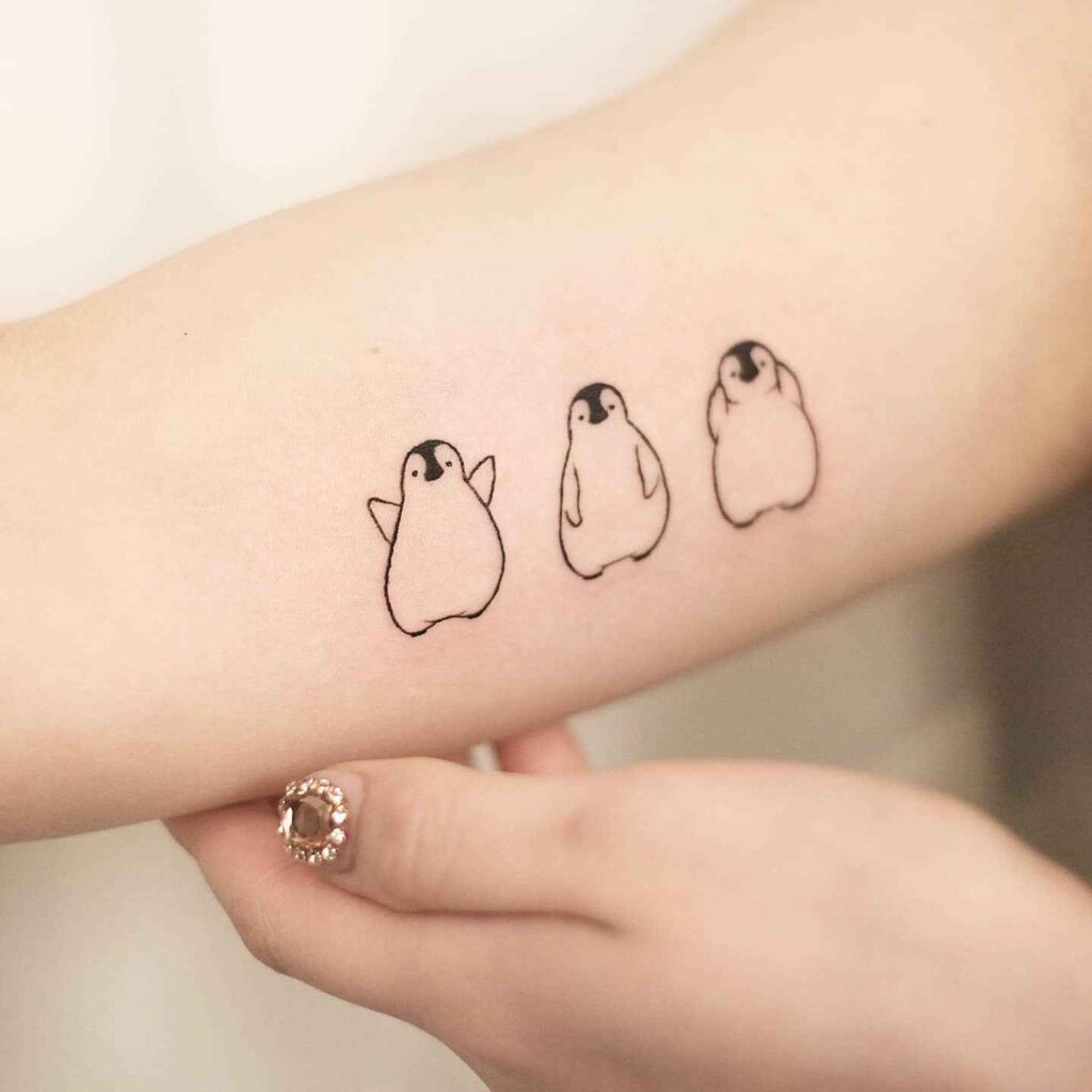 Minimalist Outline Penguin Tattoo image