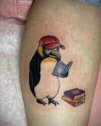 Penguin reading book tattoo image