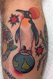 Penguin on Globe tattoo image