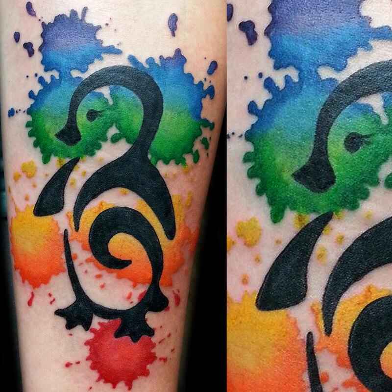 watercolor style penguin tattoo image
