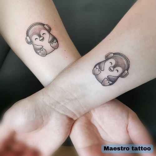 Wrist Penguin Tattoo image