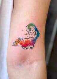 watercolor rainbow-dinosaur-tattoo