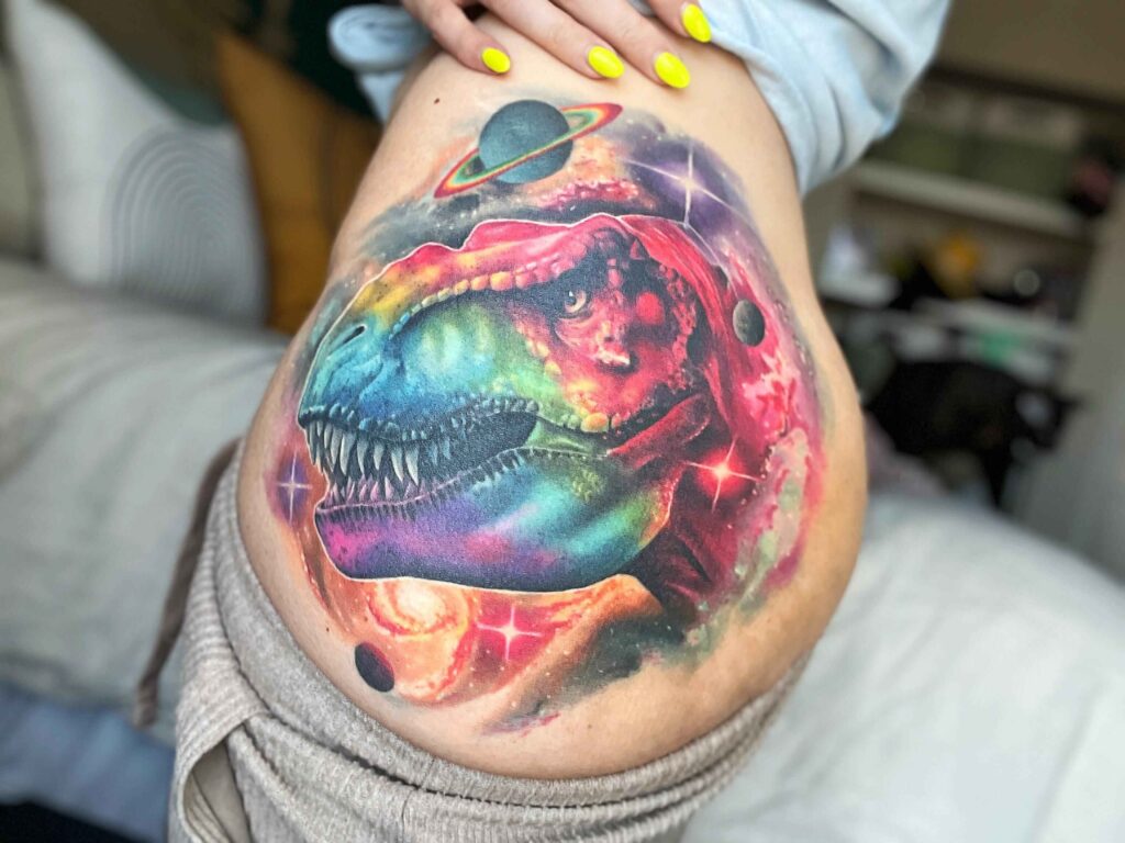 watercolor rainbow-dinosaur-tattoo
