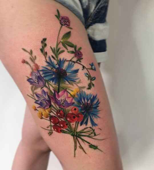Bouquets and Wreaths thigh tattoo image