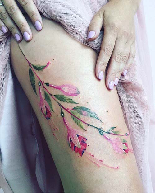Watercolor Blossoms thigh tattoo design by maestro tattoo